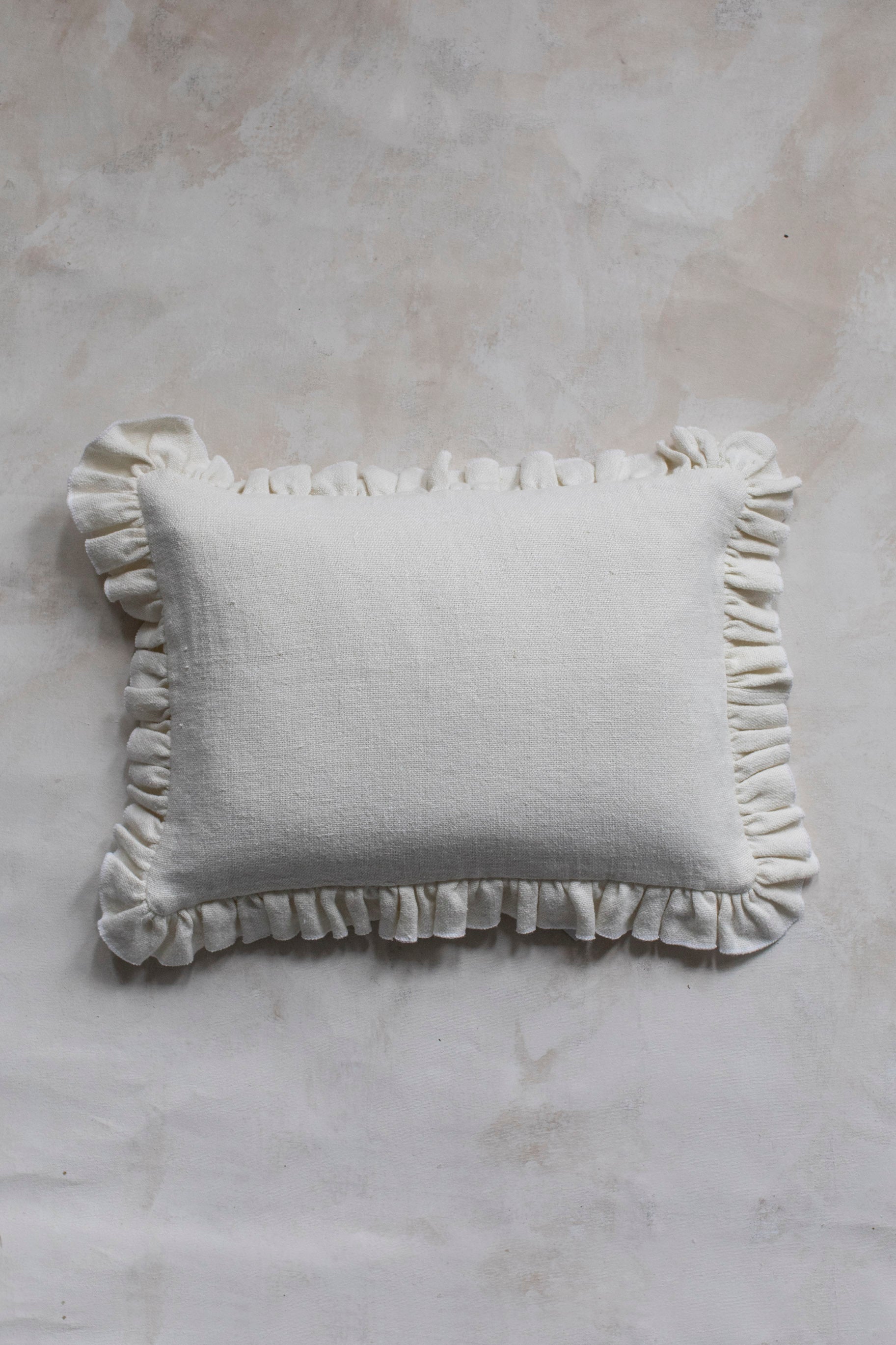 Anika Solid Cream Pillow with Ruffle