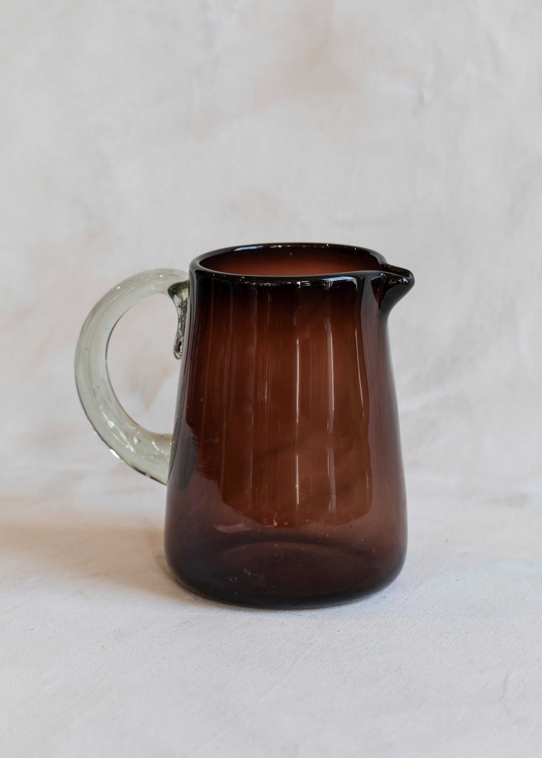 handblown_glass_pitcher_tamarind-3_e951621f-57b3-40f0-af75-64488bc0f0d5.jpg