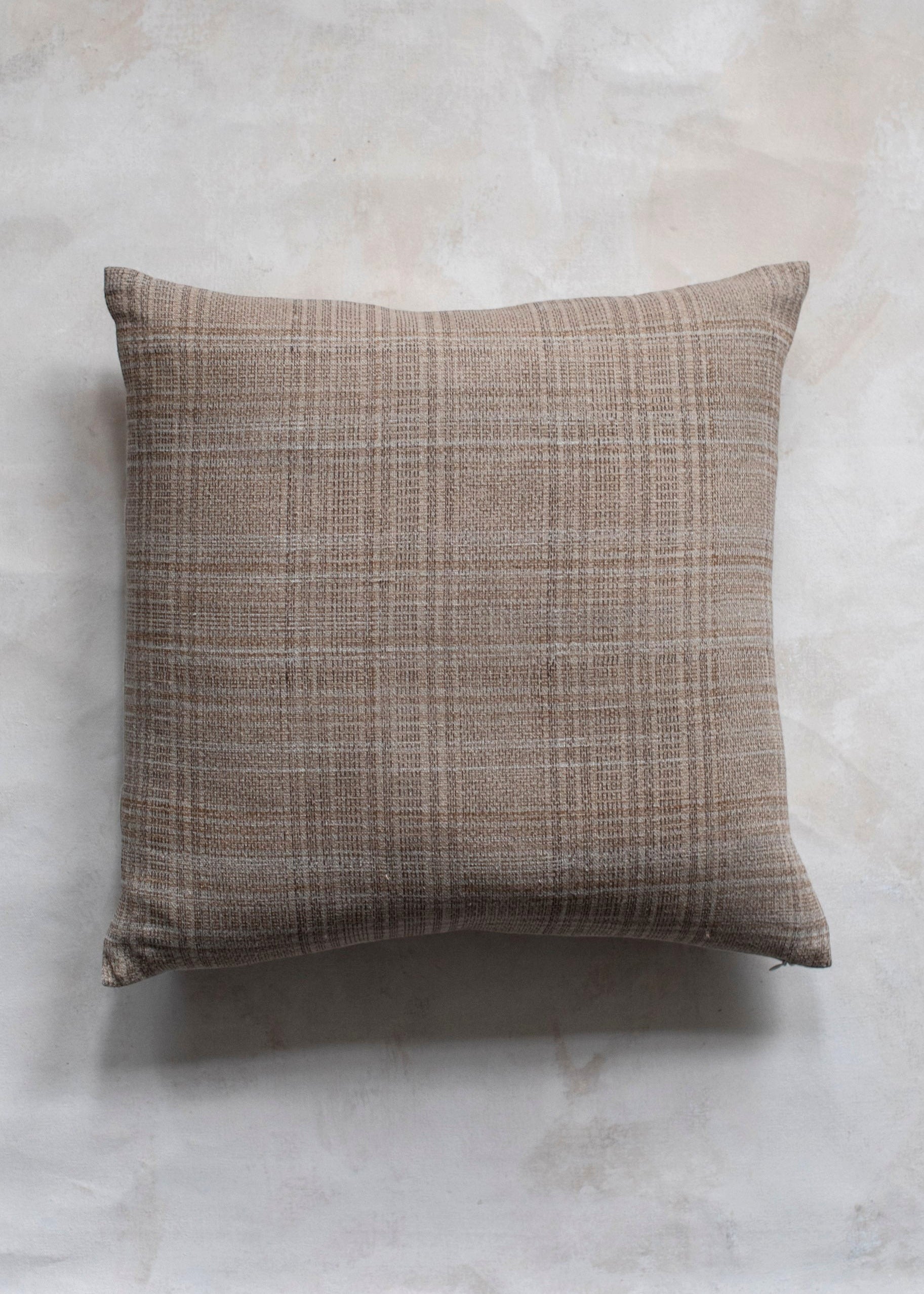 Hoppe Shoppe Kantha Coco pillow in chocolate and white linen with a hand block-printed grid pattern.