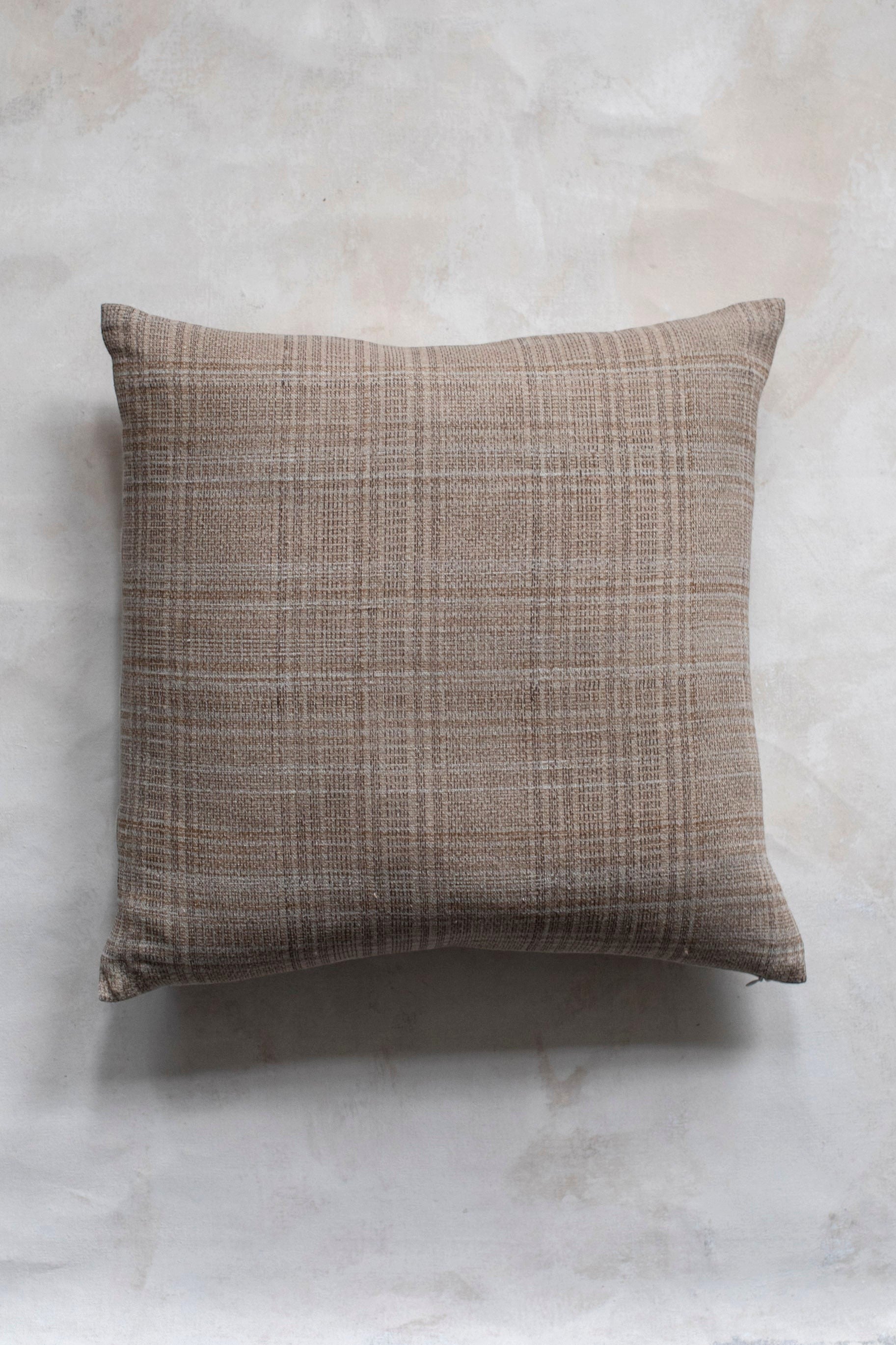 Hoppe Shoppe Kantha Coco pillow in chocolate and white linen with a hand block-printed grid pattern.