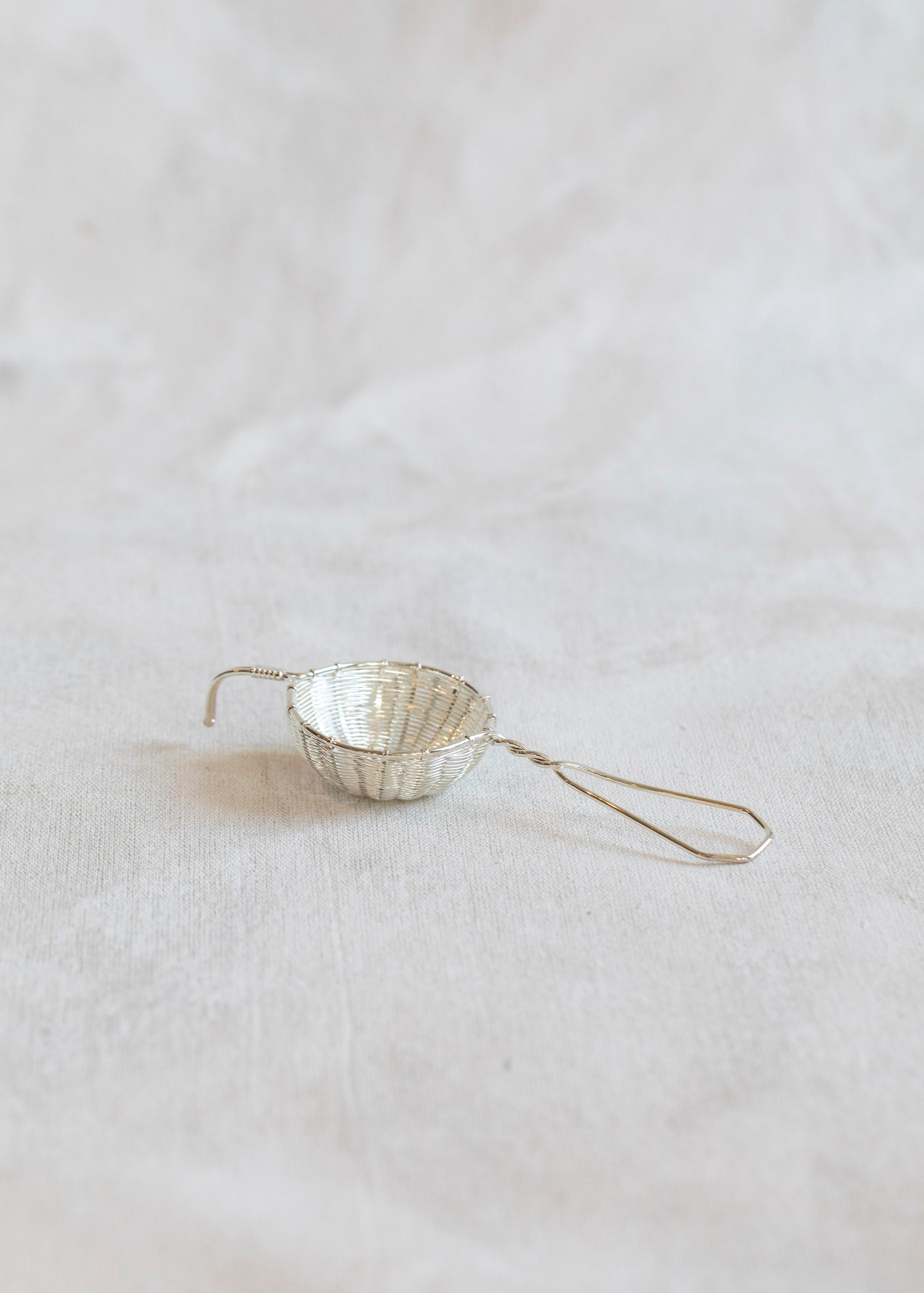 petite_silver_basket_tea_strainer-3_071ad60a-31e5-4b3f-8c0f-d77f6c810715.jpg