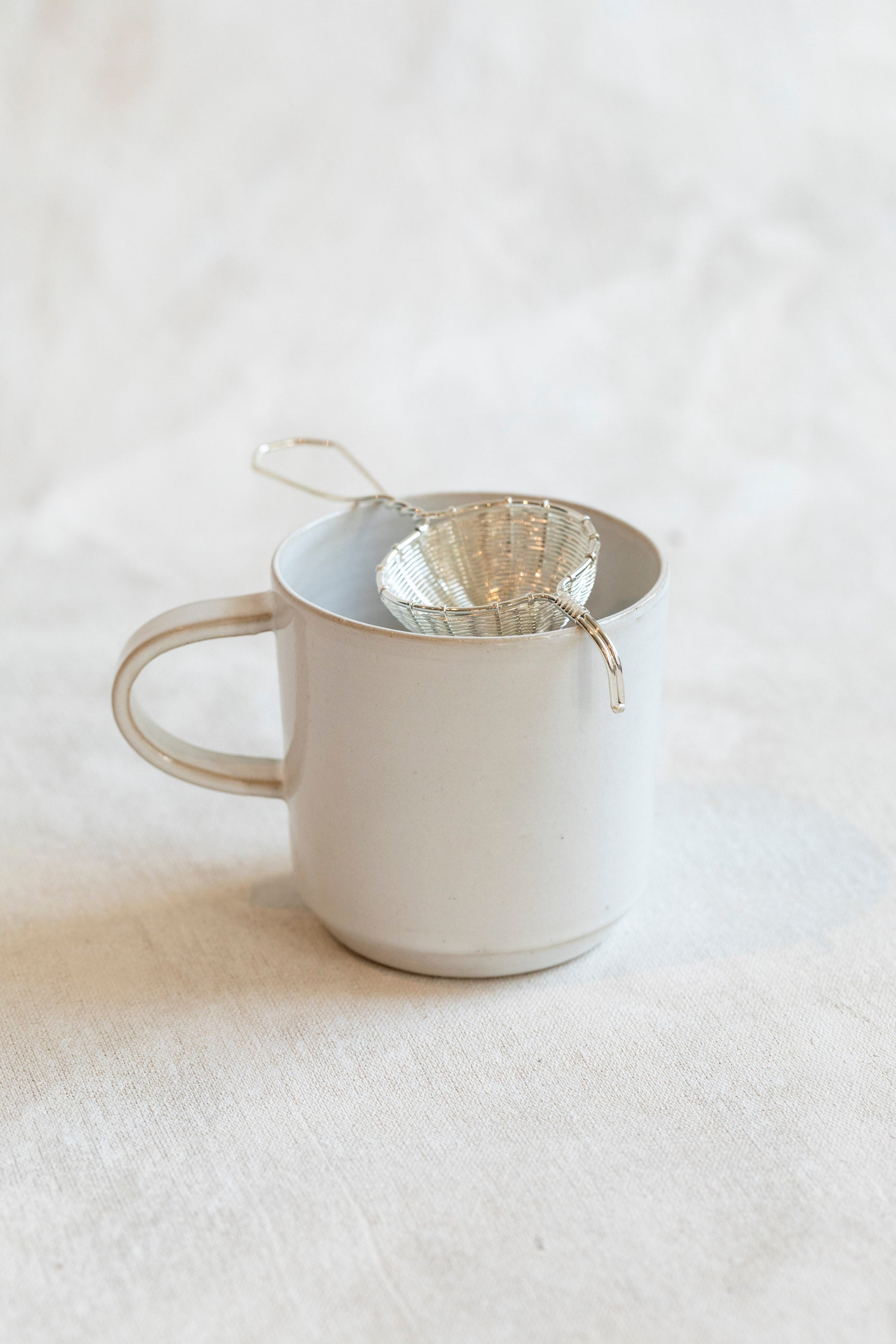petite_silver_basket_tea_strainer_46f1a326-892d-4399-b94b-4fd1375e6c68.jpg