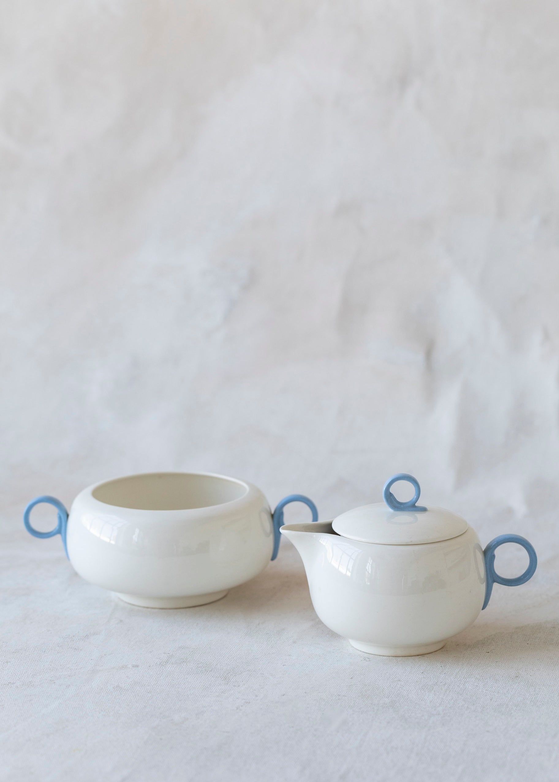 vintage_blue_handled_cream_sugar_bowls.jpg