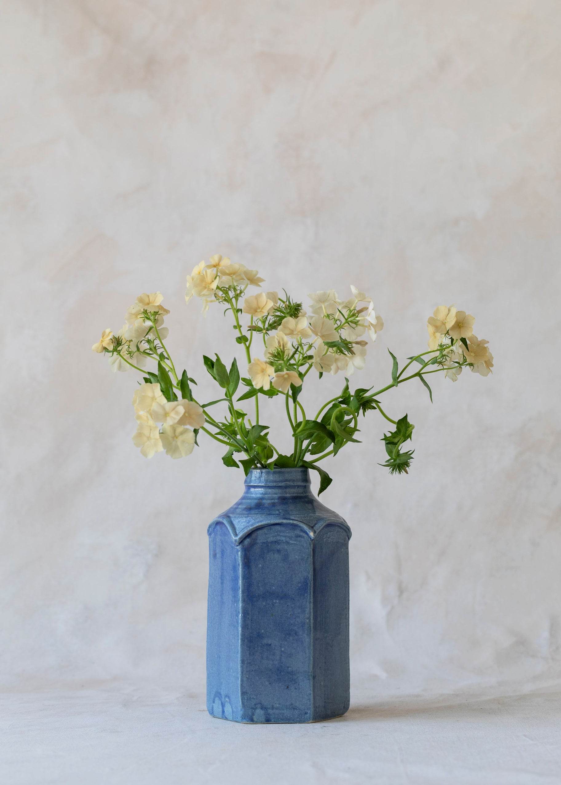 vintage_blue_hexagon_bottle_vase.jpg
