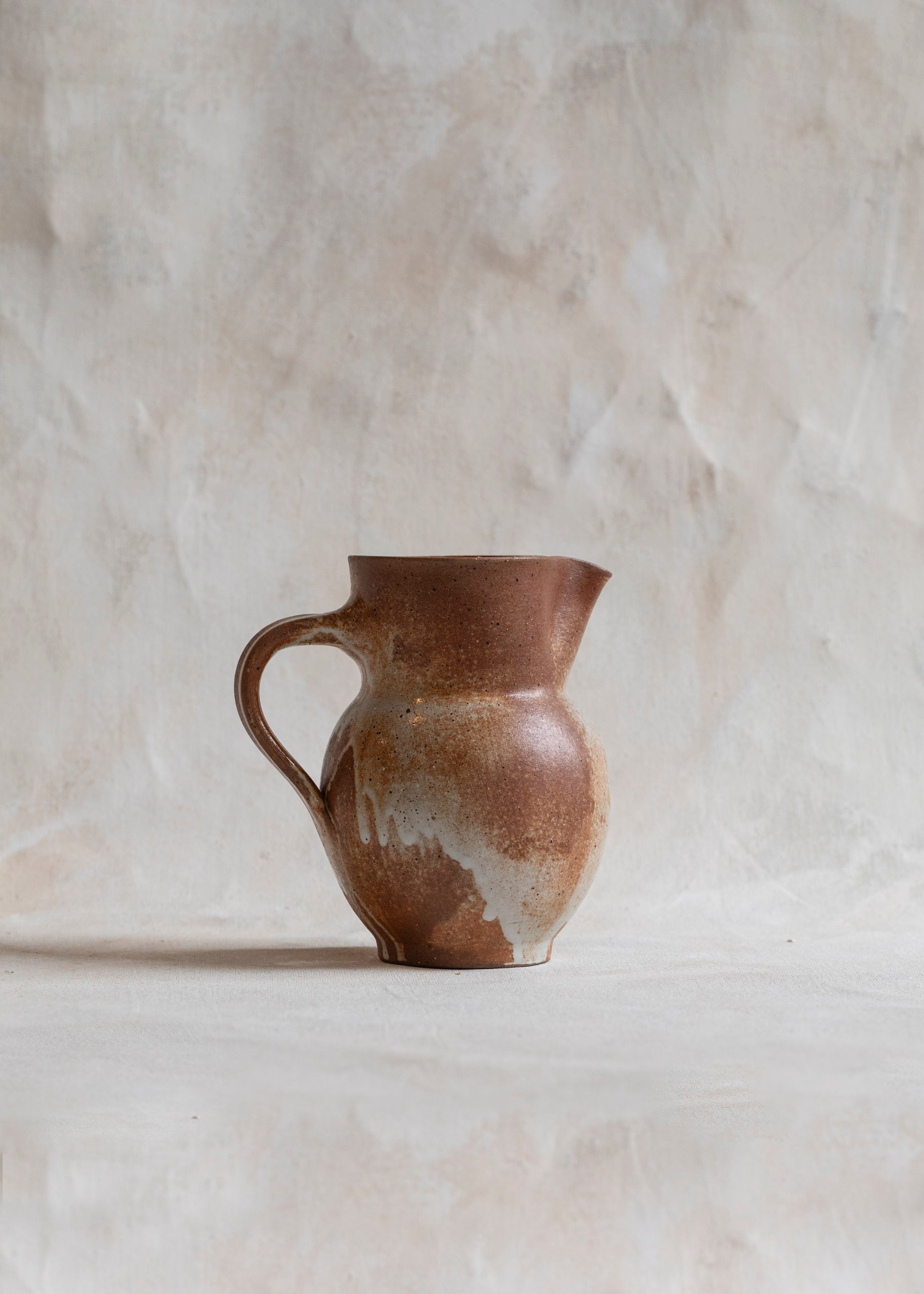 vintage_orange_ceramic_pitcher_jug.jpg