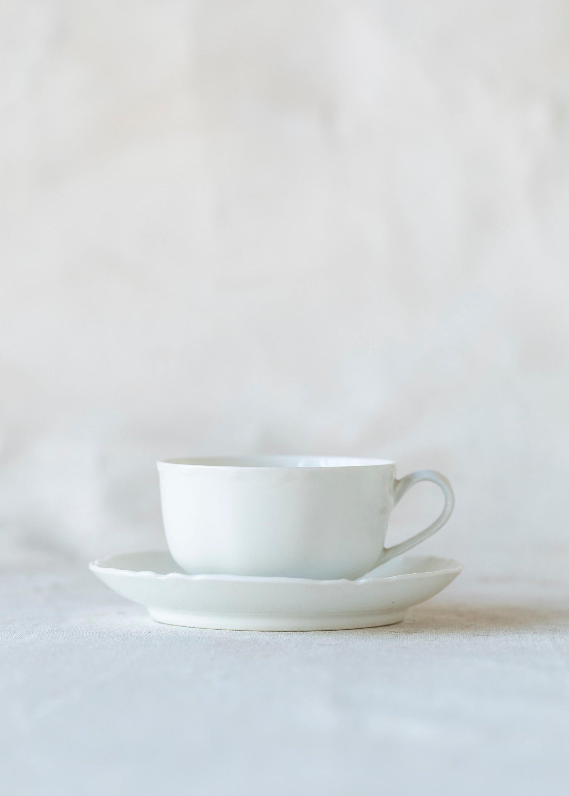 vintage_porcelain_teacup_saucer_set.jpg