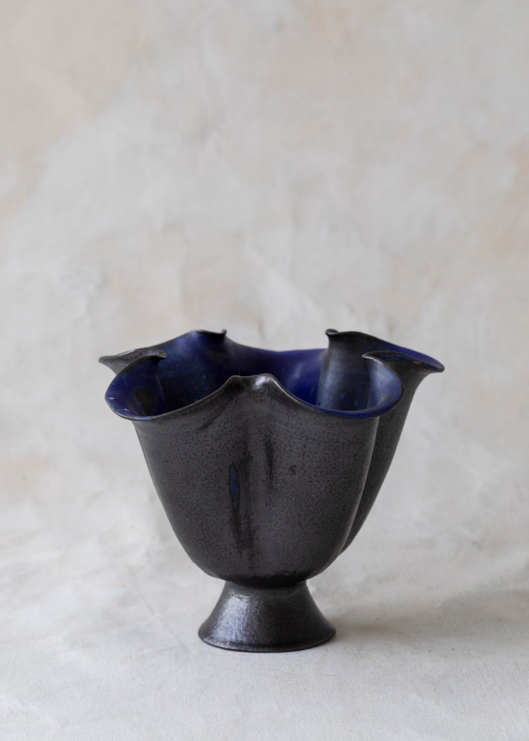 vintage_wavy_black_ceramic_blue_pedestal_bowl-2.jpg