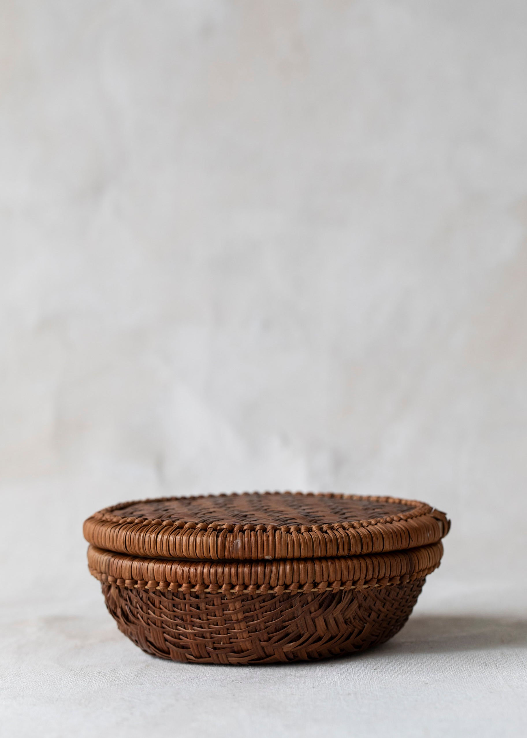 vintage_woven_round_lidded_basket.jpg