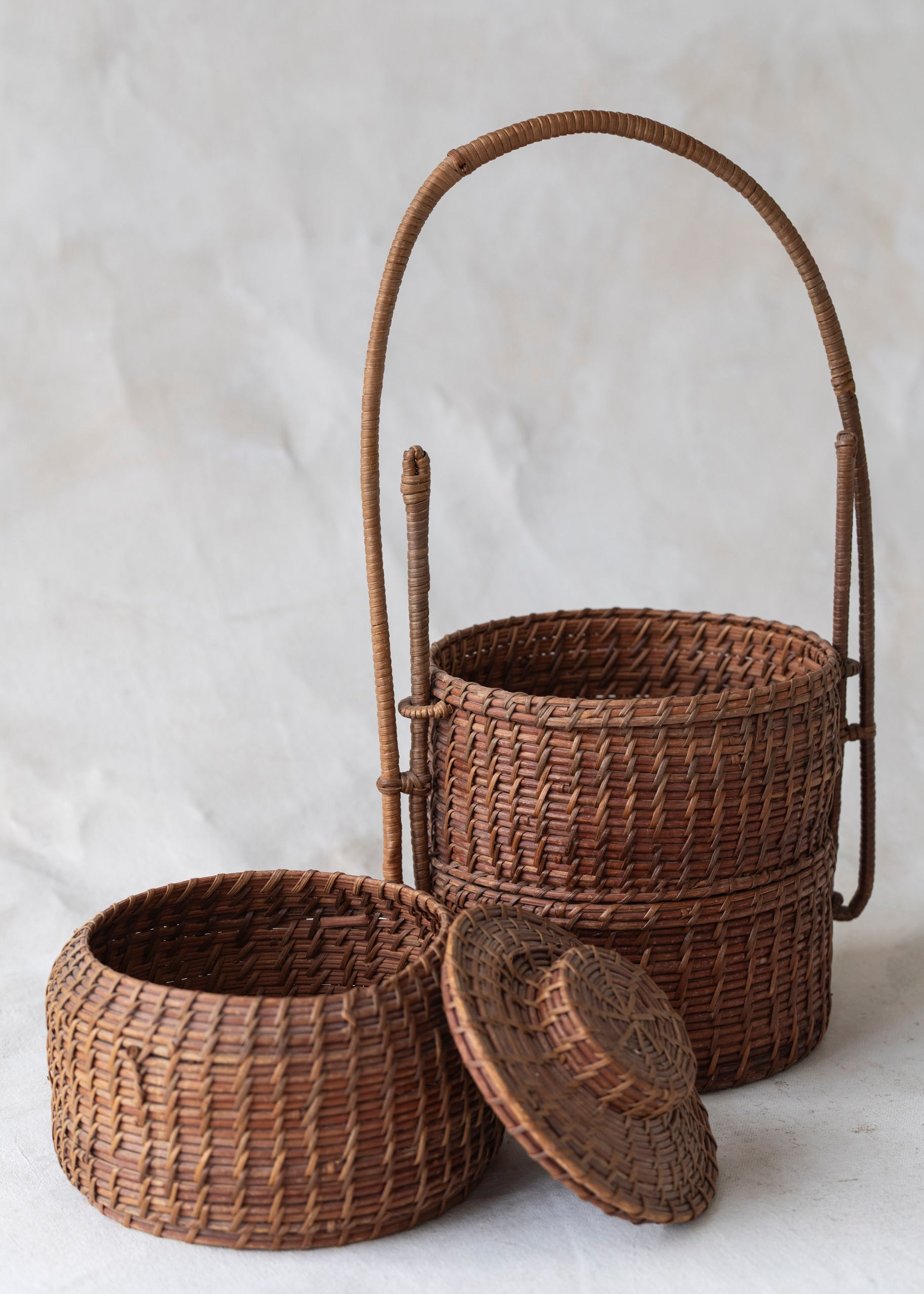 vintage_woven_tiered_container_basket_Set-2.jpg